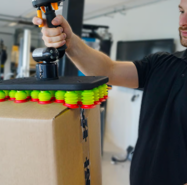 Manipulación rápida de cajas con FlexiGrip Sistema FlexiGrip para manipulación rápida de cajas en operaciones logísticas
